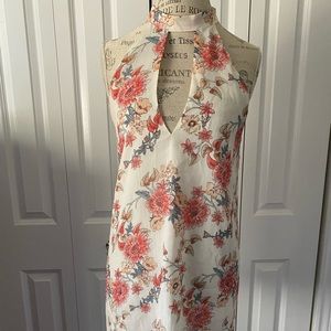 Forever 21 flower print dress with beaded closure.